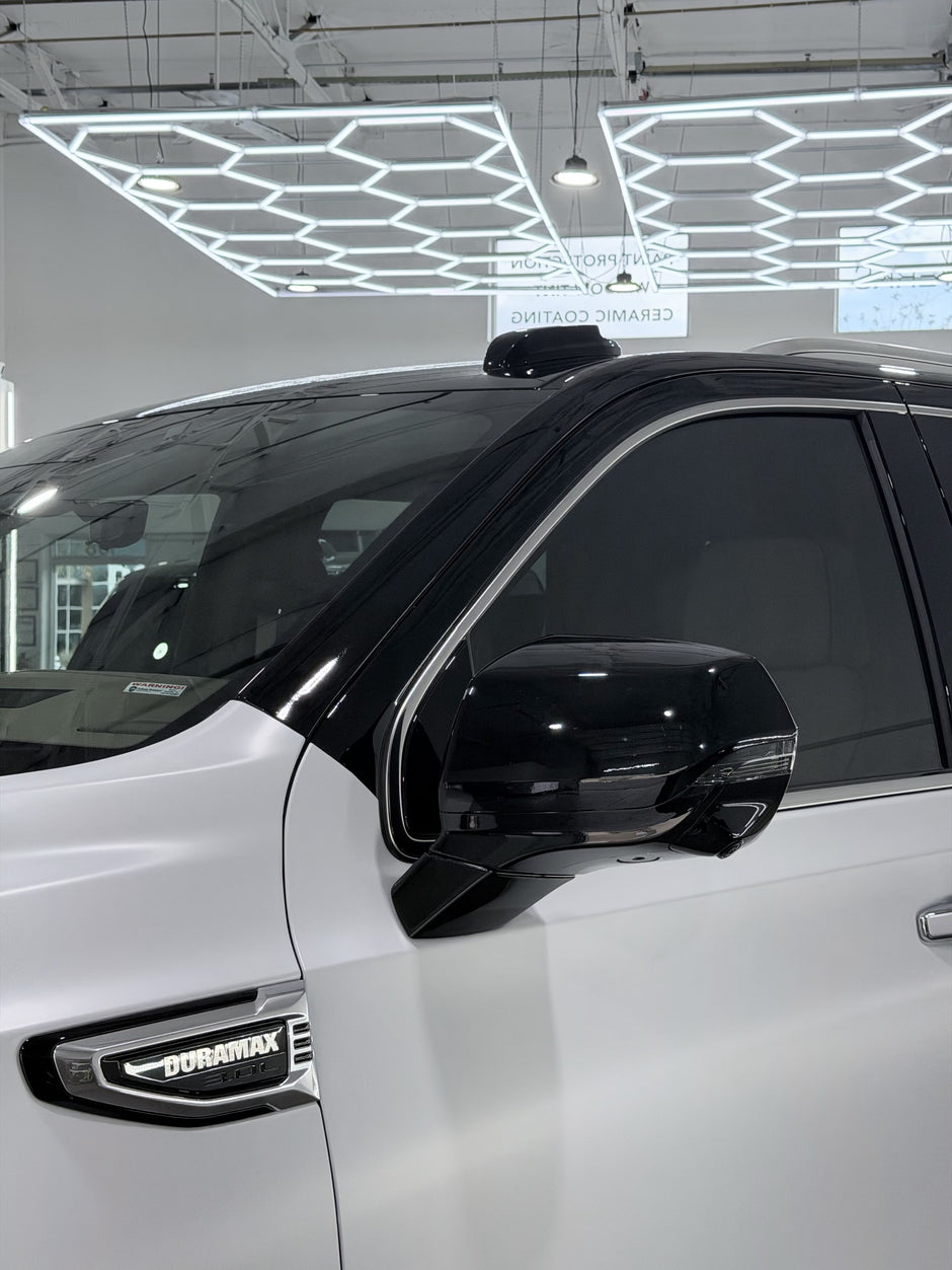 Matte white GMC with tuxedo top
